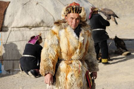 Kosh-Agach,Russia - September 21, 2014: the hunter with an eagle at the festival: Berkut-wing Chu steppeのeditorial素材