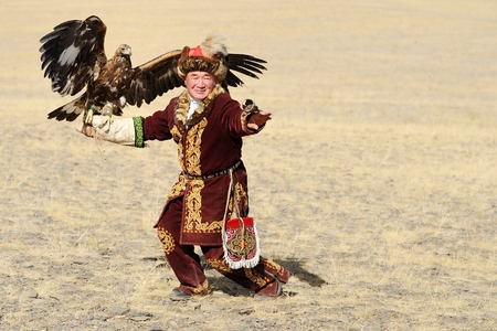 Kosh-Agach,Russia - September 21, 2014: the hunter with an eagle at the festival: Berkut-wing Chu...