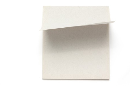 A blank postit note, isolated on white.
