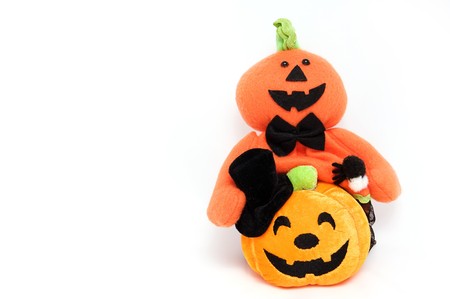 Trick halloween ghost caddy and smiling pumpkin shaped dollの写真素材