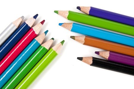 Color pencils in arrange in color wheel colors on white backgroundの写真素材