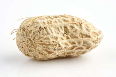 Closeup of a peanut with white background.