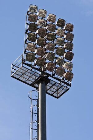 A bank of lights at a football stadiumの写真素材