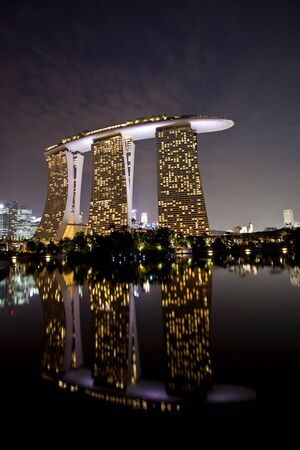 Singapore, Singapore - SEPTEMBER 10, 2012: Marina Bay Sands, designed by Moshe Safdie, the integrated resort casino and shopping center in Singapore.のeditorial素材