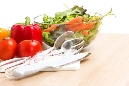 Mix of vegetables on salad on wood background.の写真素材