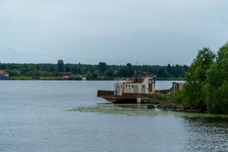 Old abandoned ship on the Volga River in Novaya Ladoga, Leningradskaya Oblast, Russiaの写真素材