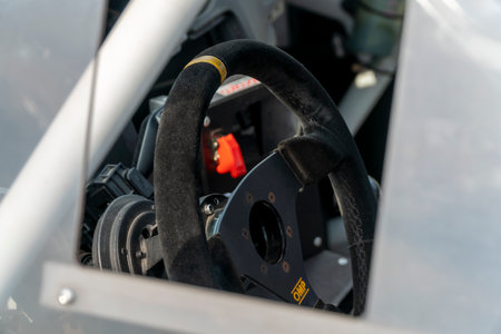Close up view of the steering wheel of a racing car.の写真素材