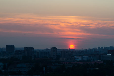 Sunset over the city. Landscape of sunset over the city.の写真素材