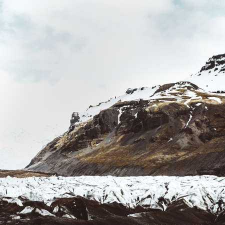Mountain landscape with snow in Icelandの写真素材