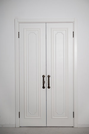 Closed White Double Door with Symmetrical Handles