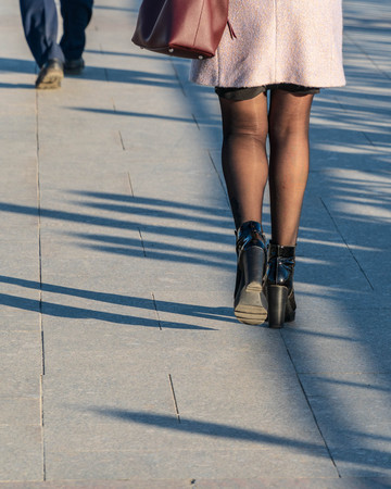 Young girls walk and relax outside on a warm sunny dayの写真素材
