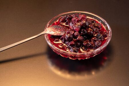 blackcurrant berries with sugar close-up.の写真素材