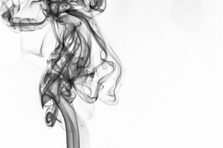 Beautiful patterns and lines of smoke on a white background.の写真素材