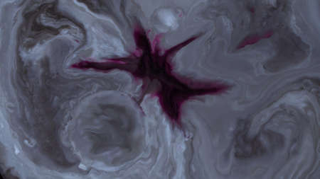 Abstract background of moving liquid paints close-up