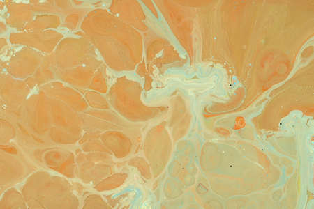 Multicolored paints create a beautiful abstract background.