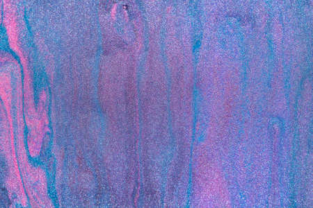 Abstract colored background from liquid flowing paints