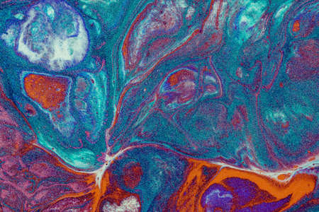 Abstract colored background from liquid flowing paints