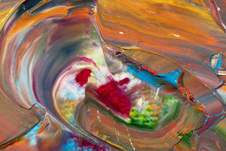 Mixed oil paints close-up. Colorful abstract background