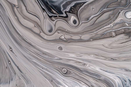 Marble pattern, abstract liquid paints background closeup.の写真素材