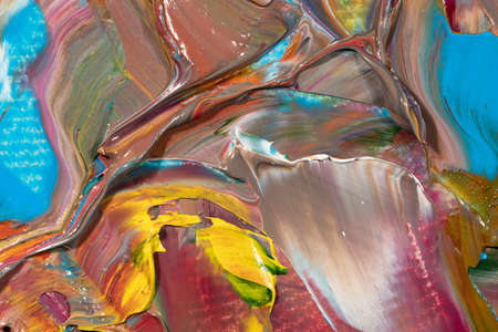 Mixed oil paints close-up. Colorful abstract background