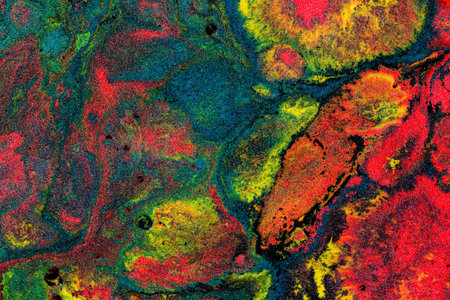 Abstract colored background from liquid flowing paints