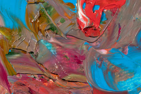 Mixed oil paints close-up. Colorful abstract background