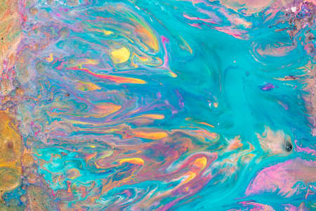 Abstract background from flowing colored liquid paints
