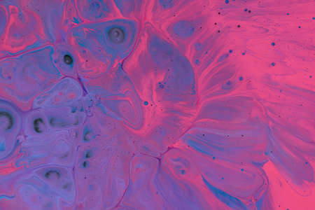 Marble pattern from colored liquid acrylic paints. Colorful abstract background