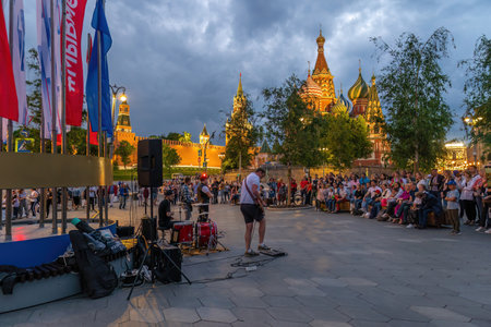 Moscow, Russia - June 11, 2022: Street musicians perform near Red Square