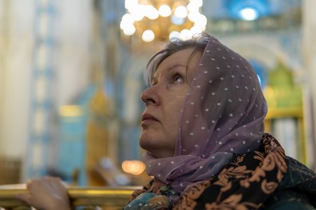 Portrait of a woman in an Orthodox churchの写真素材