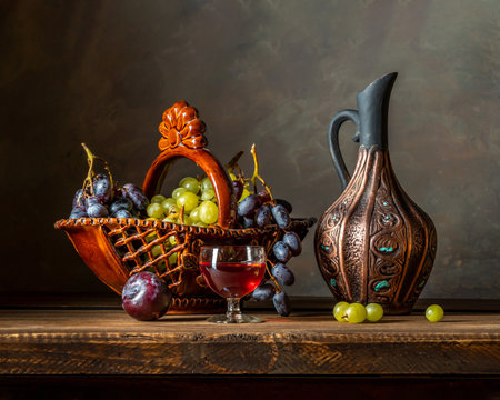 Still life with fruits in dark colors.の写真素材