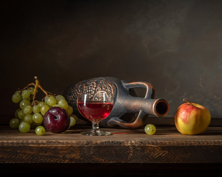 Still life with fruits in dark colorsの写真素材