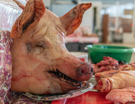 severed pig's head is sold in the market.の写真素材