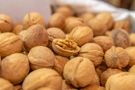 walnuts in a bag are sold at the market.の写真素材