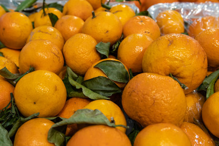 A lot of tangerines are sold in the supermarket.の写真素材