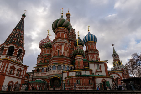 Vibrant scene of Saint Basil's Cathedral in Moscow's Red Square, showcasing colorful onion domes, red brick towers, and ornate detailing. A iconic symbol of Russia's history, culture, and architectural splendor.の写真素材