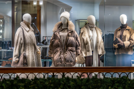 Winter Fashion Display Of Cozy Coats And Accessories In A Boutique Window.