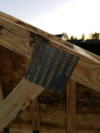 A gussett plate on a roof truss