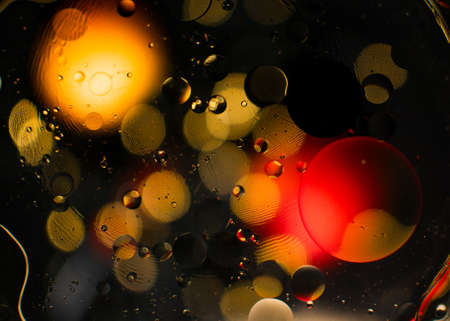 Background with bubbles. Blurred light. Beautiful bokeh. Cosmic red glow