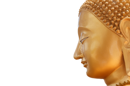 Close Up of Golden Buddha Statue Face Head on White Isolated for Background.の写真素材