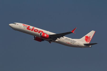 Chiang Mai, Thailand. April 14, 2018. Thai Lion Air Boeing 737 MAX 9 Reg. HS-LSH Taking Off from Chiang Mai International Airport with Gate Terminal Background.のeditorial素材