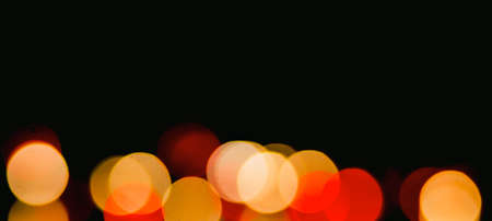 Abstract background image of beautiful multicolored bokeh made by blurry lenses.
