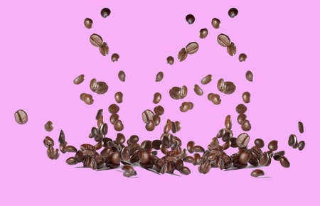 Roasted coffee beans on a separate colored background on the cutting path included. isolated background. Clipping path included.の写真素材