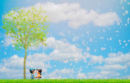 Couple dolls are kissing in love on Valentine's Day under a beautiful romantic tree.の写真素材