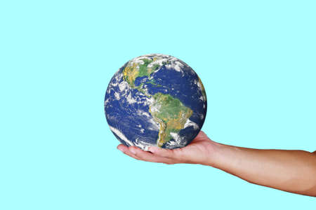 Man's hand holding Earth on a colored background with clipping path for use in conservation, global...