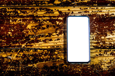 Mobile phone with blank screen or copyspace to put content in the project. black mobile phone with...