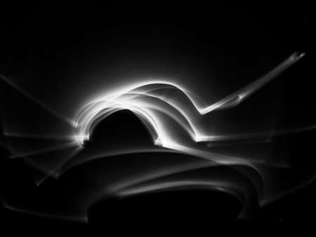 Black and white abstract image of white light. can be used as backgroundの写真素材