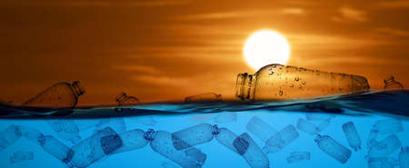plastic bottles floating in the sea Plastic waste floats in the water. The concept of plastic waste...