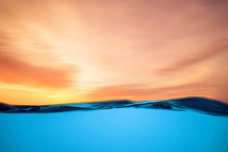 Blue sea water. Ocean surface natural background on sky. low angle view water background. BLUE UNDER WATER wavesの写真素材