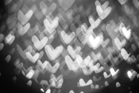 A black-and-white image of bokeh from a blurred lens for the background of your project.の写真素材